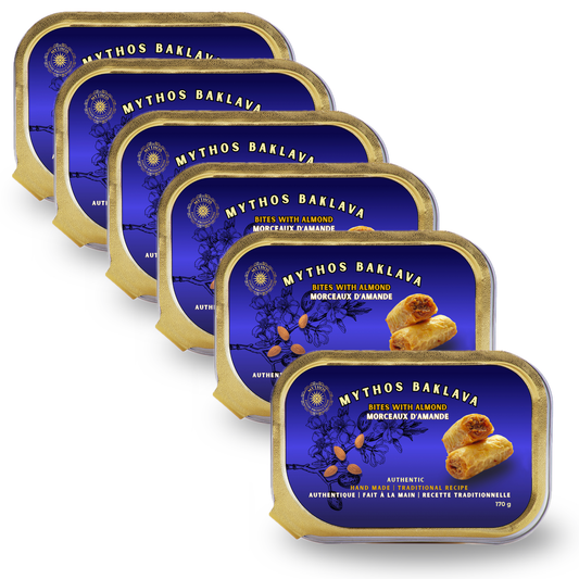 Multiple tins of Mythos Baklava on a white background