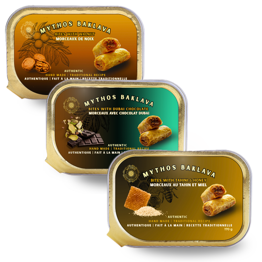 Three tins of Mythos Baklava on a white background