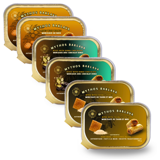 Multiple tins of Mythos Baklava on a white background